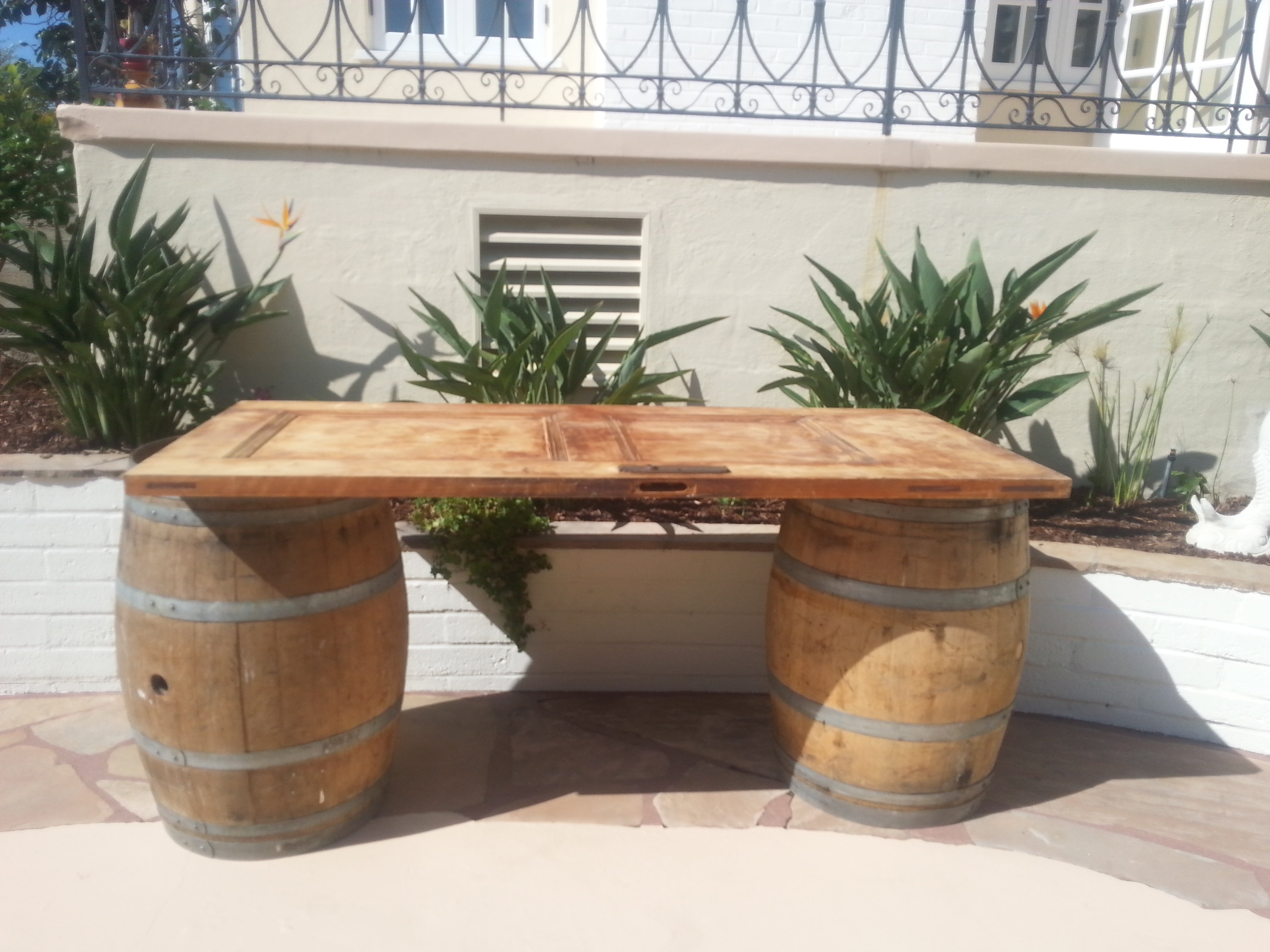 Rustic Door And Wine Barrel Table Platinum Event Rentals